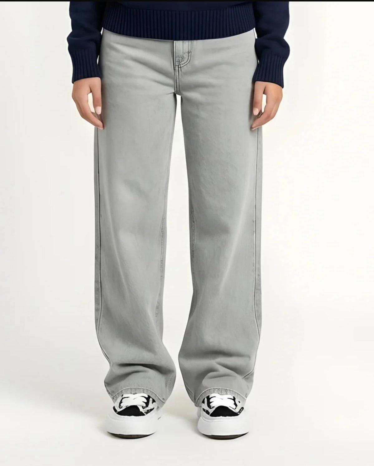 Grey straight jeans on model, full-length front view